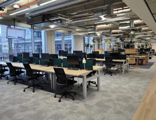 An office with black chairs.