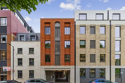 Great Suffolk Yard from Great Suffolk Street, a brick and stone facade with a recessed entrance
