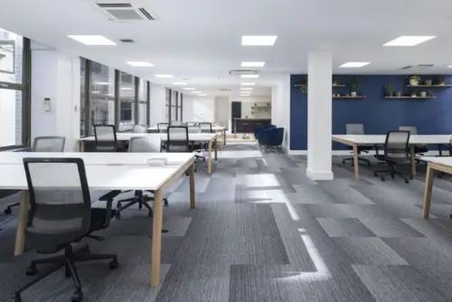 An office with black chairs.
